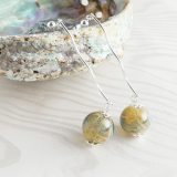 Shiny Swirl Apple Green Blown Glass Dangle Earrings - Image 2