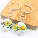 Saffron Discs on Silver Links Dangle Earrings
