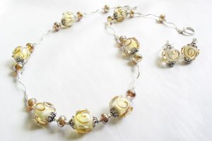Cream Metallic Gold Necklace and Earrings