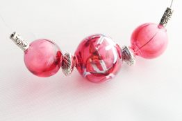 8170 Shiny Metallic Swirl over Ruby Triple Blown Glass Hollow Bead Floating Wire Necklace