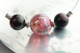 8173 ST 2 Ruby Black Swirl Triple Blown Glass Hollow Bead Floating Wire Necklace